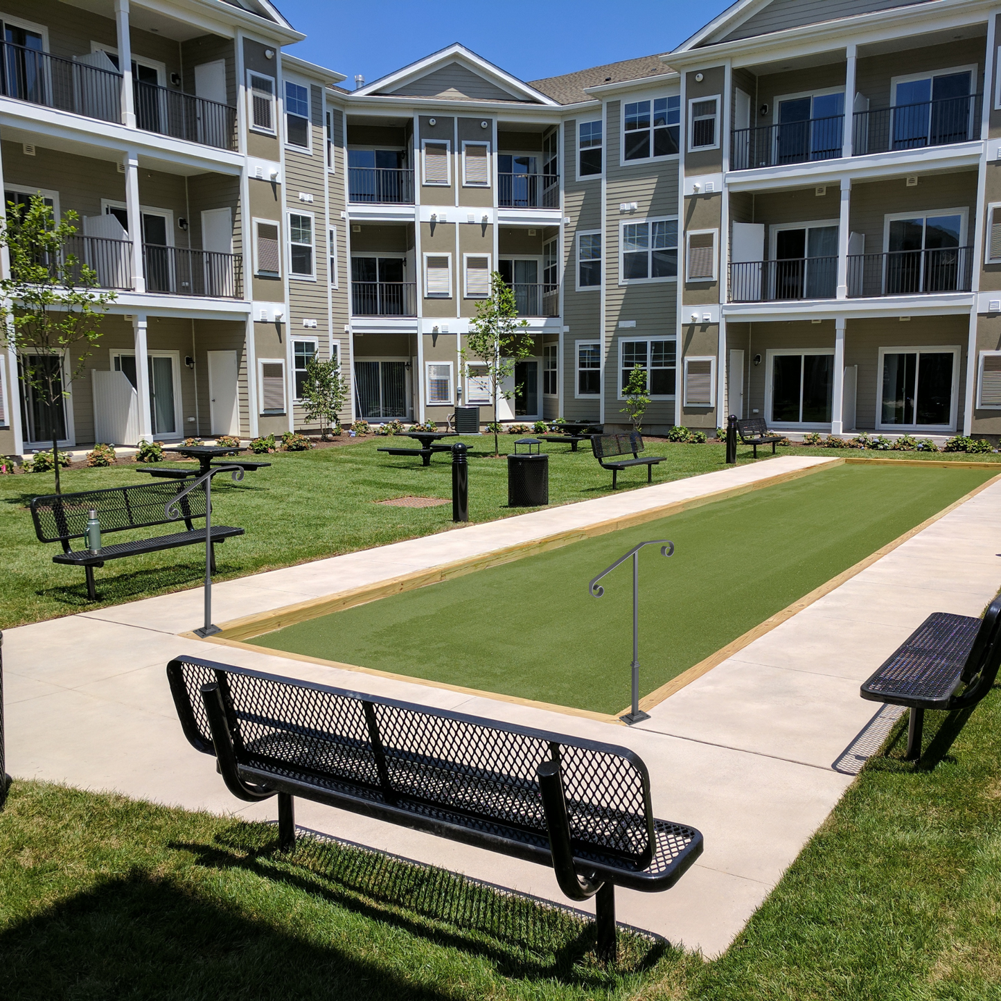 Bocce court handrails on bocce court