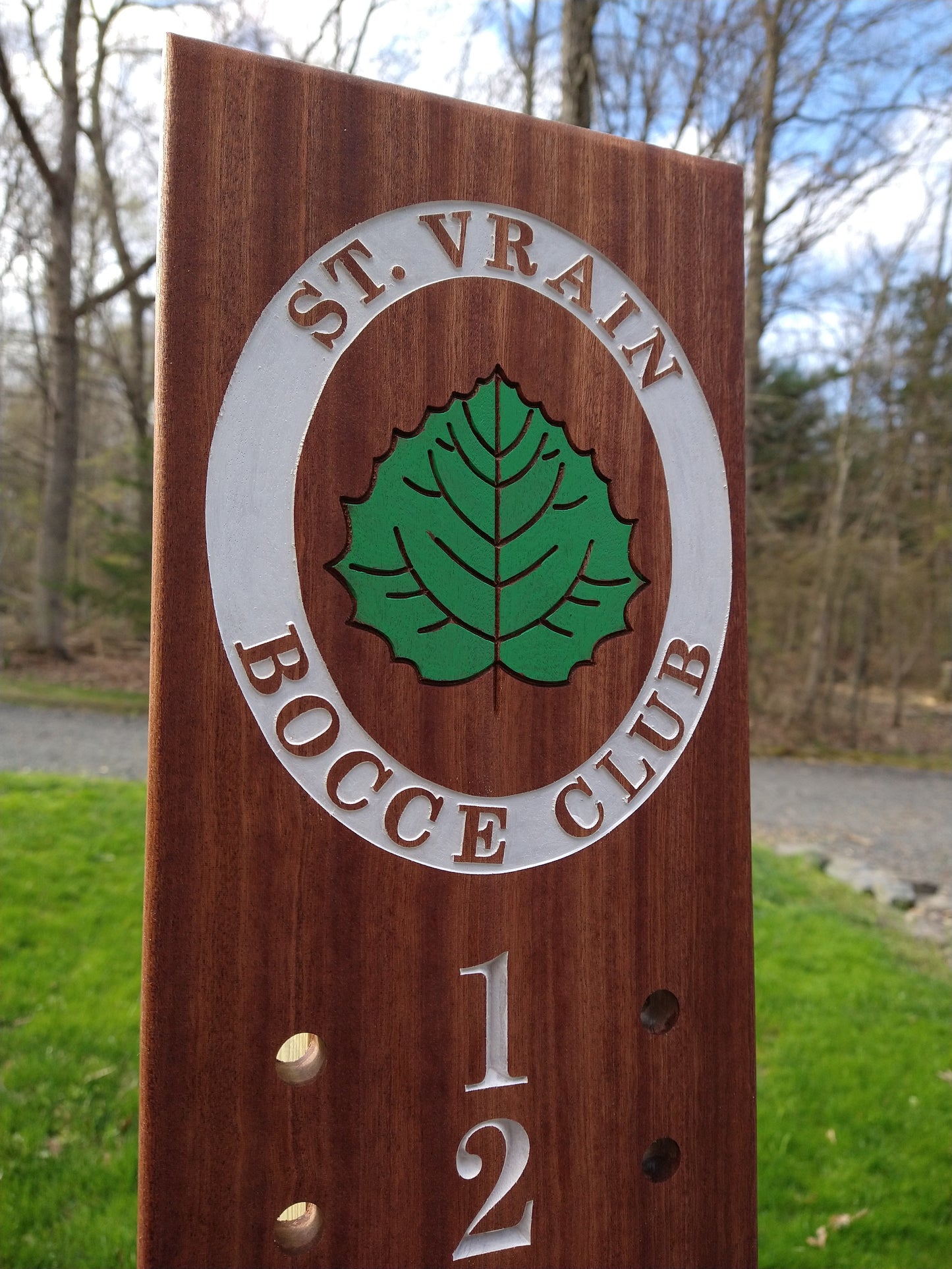 St Vrain logo bocce scoreboard