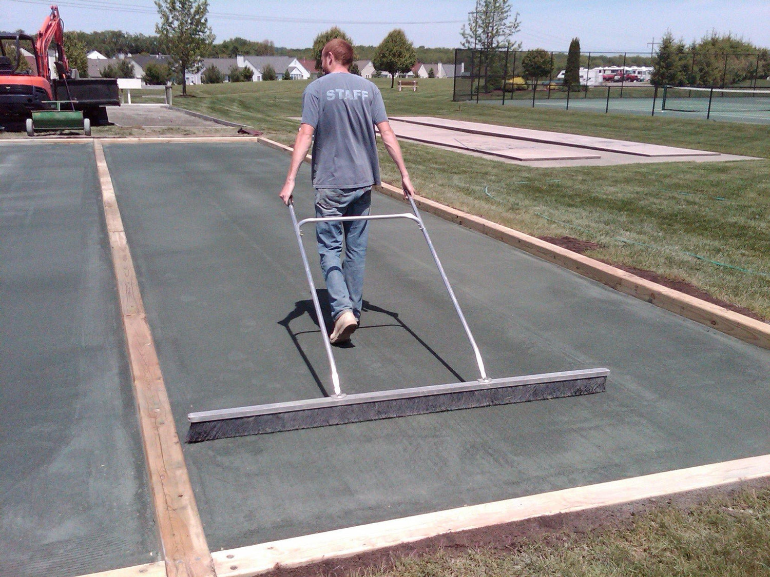 How to broom a bocce court