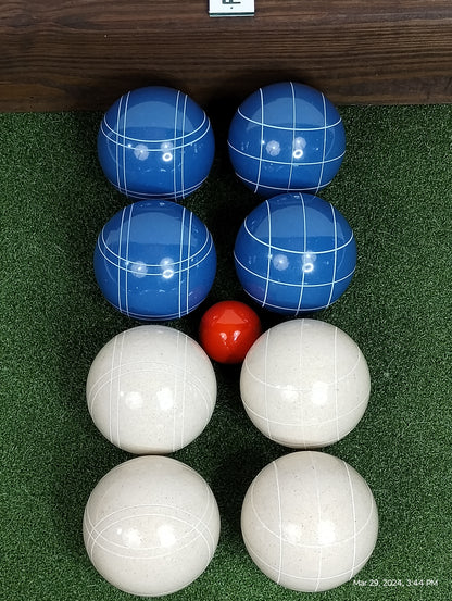 Bocce ball set . 4 blue and 4 white  with red pallina