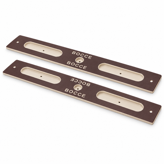 Two empty brown bocce ball holders with tan recesses and BOCCE engraving on a white background.