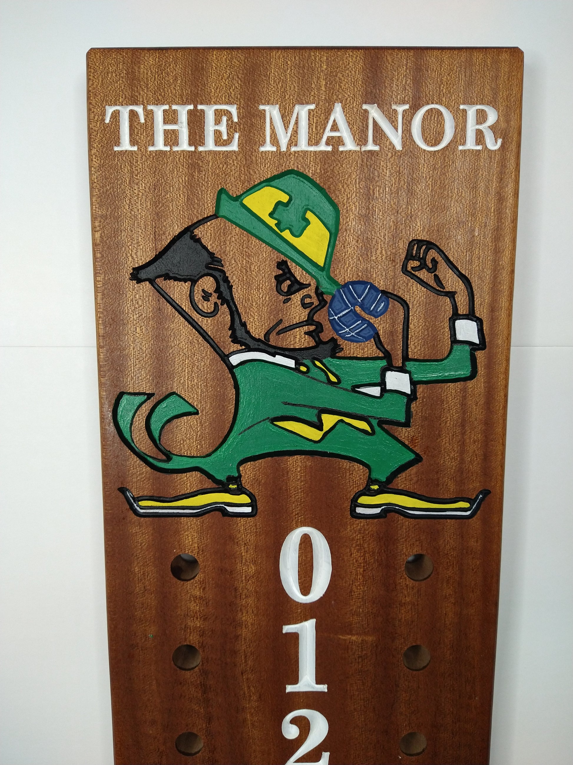 The Manor logo bocce scoreboard